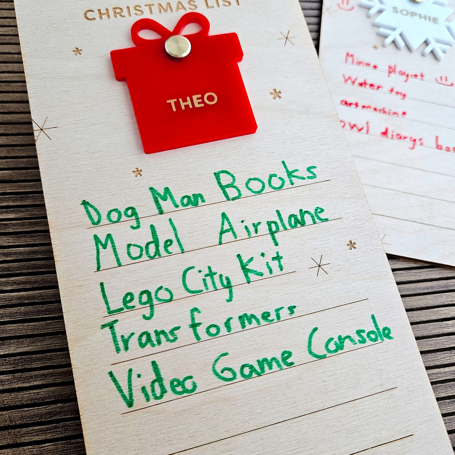 Wooden Christmas list filled out with children's handwriting