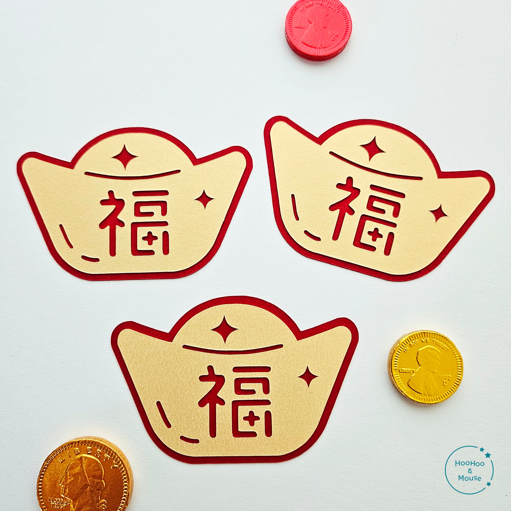 Red and gold paper money charms with lucky coins