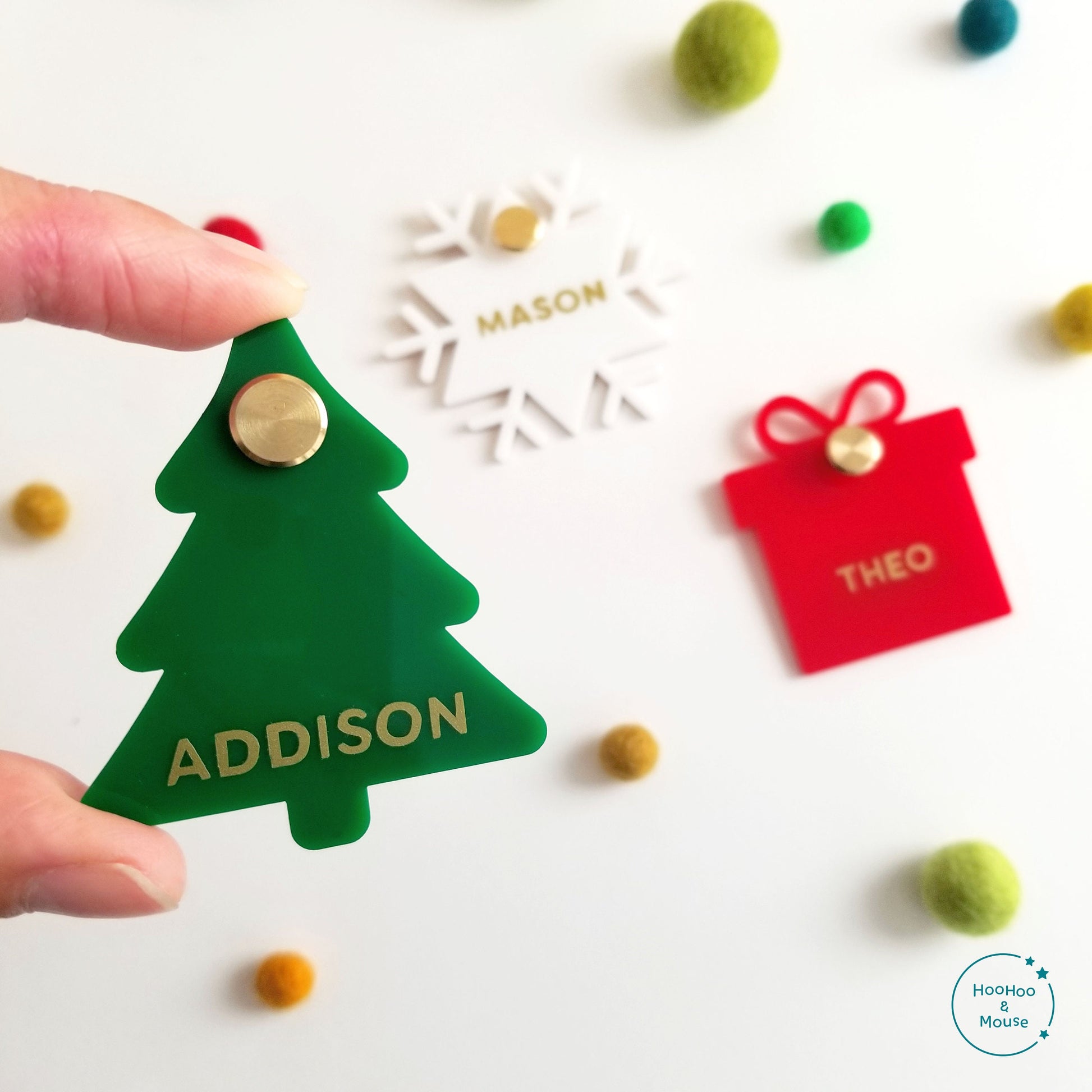 Name tags in the shape of a tree, snowflake, present